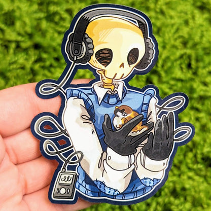 Skeleton Cade cradling a bird sticker