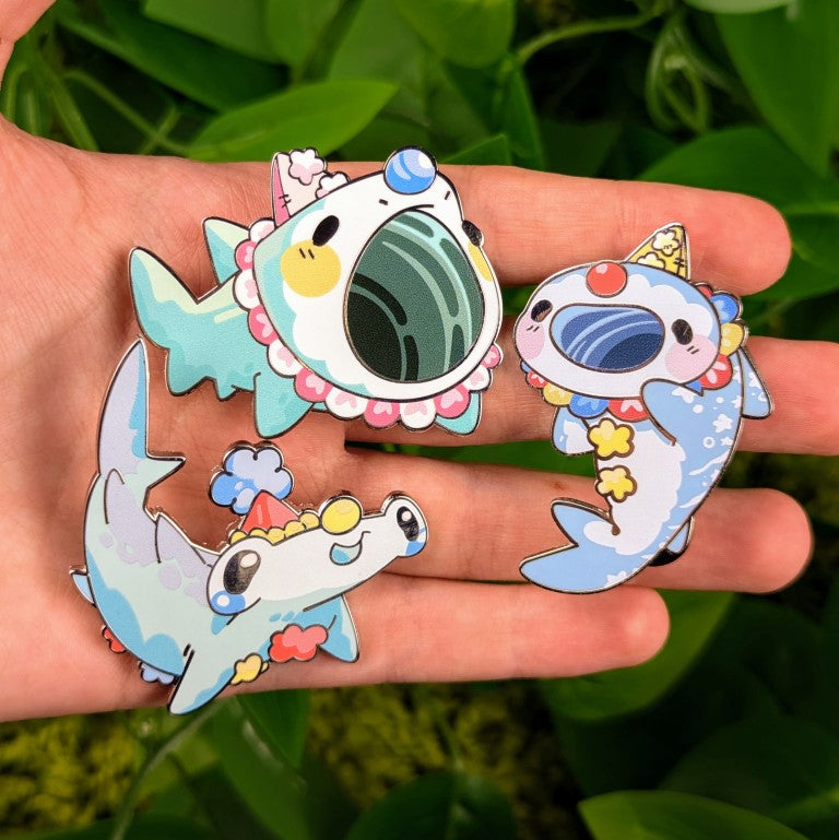 All three clown shark pins in Milky's hand