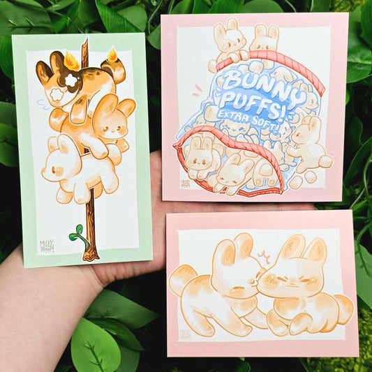 3 Marshmallow Bunnies mini prints in Milky's hand