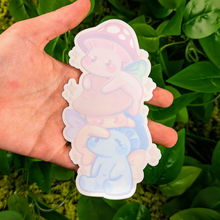 Unpeeled Mushroom Fairies Stack window sticker in Milky's Hand